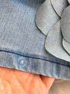 Strapless denim dress with floral applique details from Trendsi, featuring a fitted bodice and casual style.