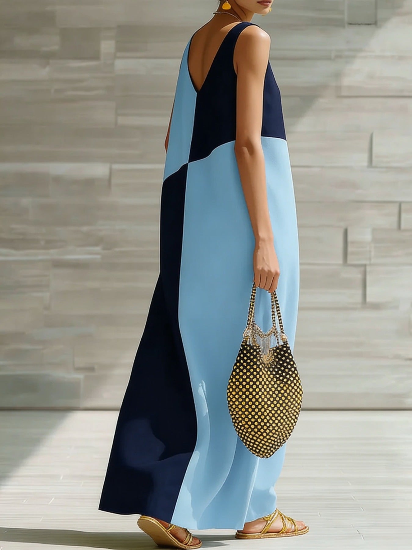 Women's chic color block sleeveless maxi dress by Trendsi, lightweight summer fashion with vibrant color blocking and flowing silhouette.