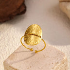 Hammered disc open ring by Shopimist featuring a textured metal design and adjustable open band style.