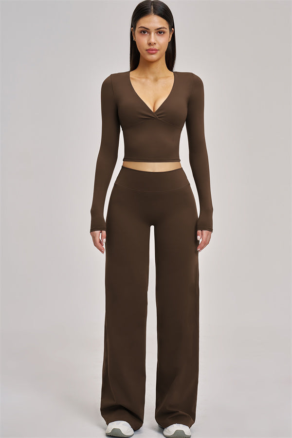 Fitglutes Activewear long sleeve crop top, stylish gym and workout shirt with fitted design and breathable fabric.