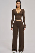 Fitglutes Activewear long sleeve crop top, stylish gym and workout shirt with fitted design and breathable fabric.