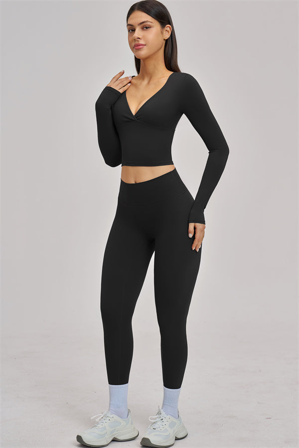 Fitglutes Activewear long sleeve crop top with fitted design and sporty style, perfect for gym and workout sessions.