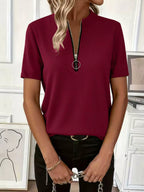 Women's ribbed half zip short sleeve casual top by Trendsi, soft stretch pullover with a fitted ribbed design and short sleeves.