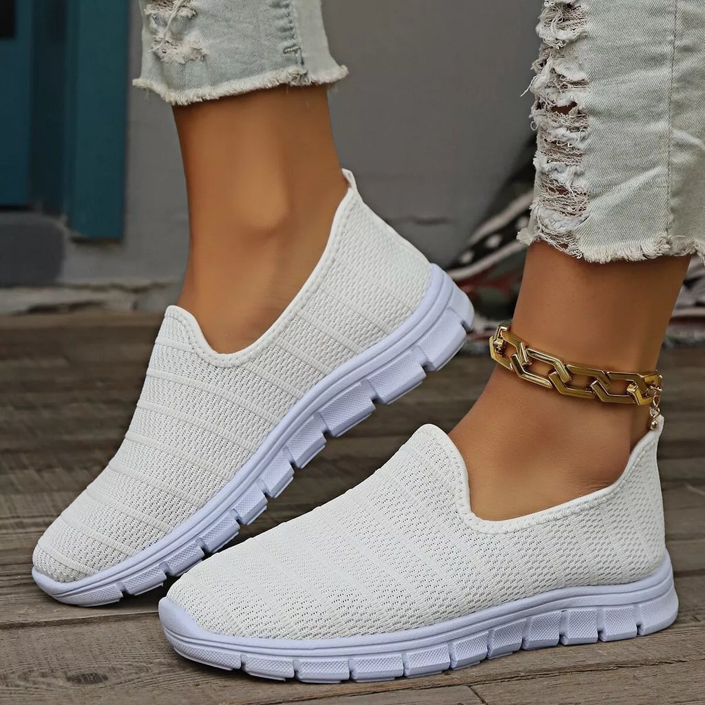 Women's breathable mesh slip-on casual walking flats by Trendsi, featuring lightweight comfort and easy slip-on design.