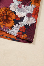 Flowy Marianna Sleeve Mini Dress in floral pattern by Threaded Pear, shown with airy sleeves and vibrant floral design.