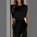 Women’s wide-leg short sleeve jumpsuit by FitiqueFit, casualwear with a relaxed fit and stylish wide-leg design.
