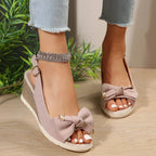 Open toe wedge sandals by Shopimist featuring a stylish design with a comfortable platform and neutral color.
