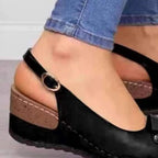 Women's comfortable peep toe wedge sandals by Trendsi, featuring a mid-heel design, casual dress shoe style, and stylish footwear.