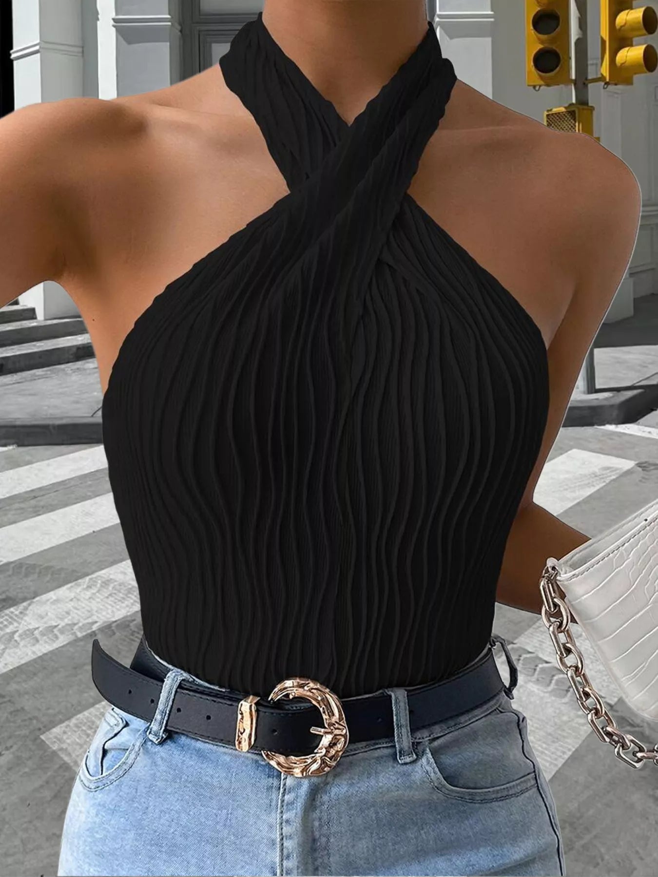 Textured halter neck tank top by Plush Fashion Hub, featuring a stylish design and sleeveless fit, ideal for casual wear.