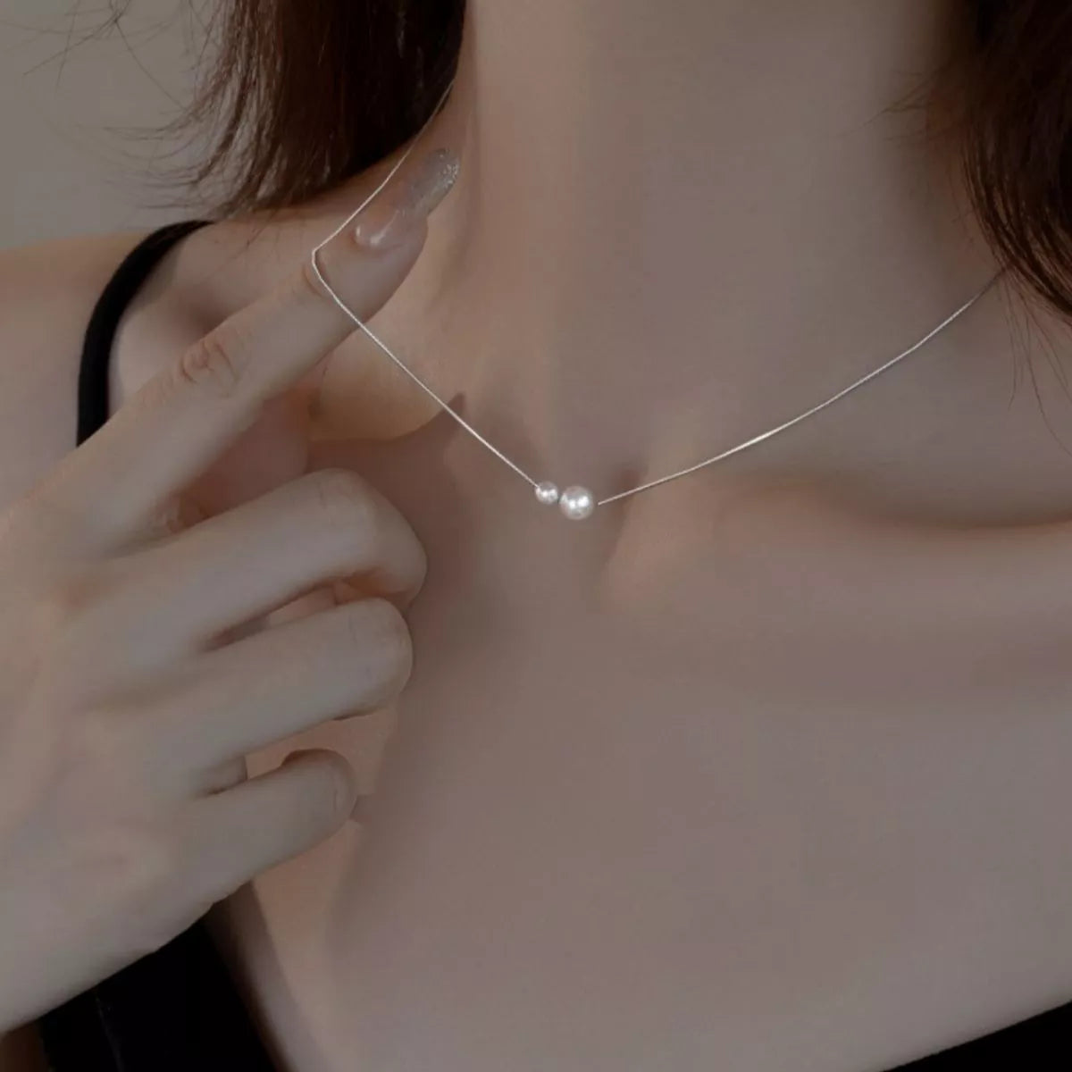 Sterling silver pearl necklace with white pearls and delicate chain, stylish jewelry piece from Plush Fashion Hub