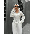 Eprolo relaxed hooded zip-up top and wide-leg trousers two-piece set, casual loungewear with hood and zip detail.