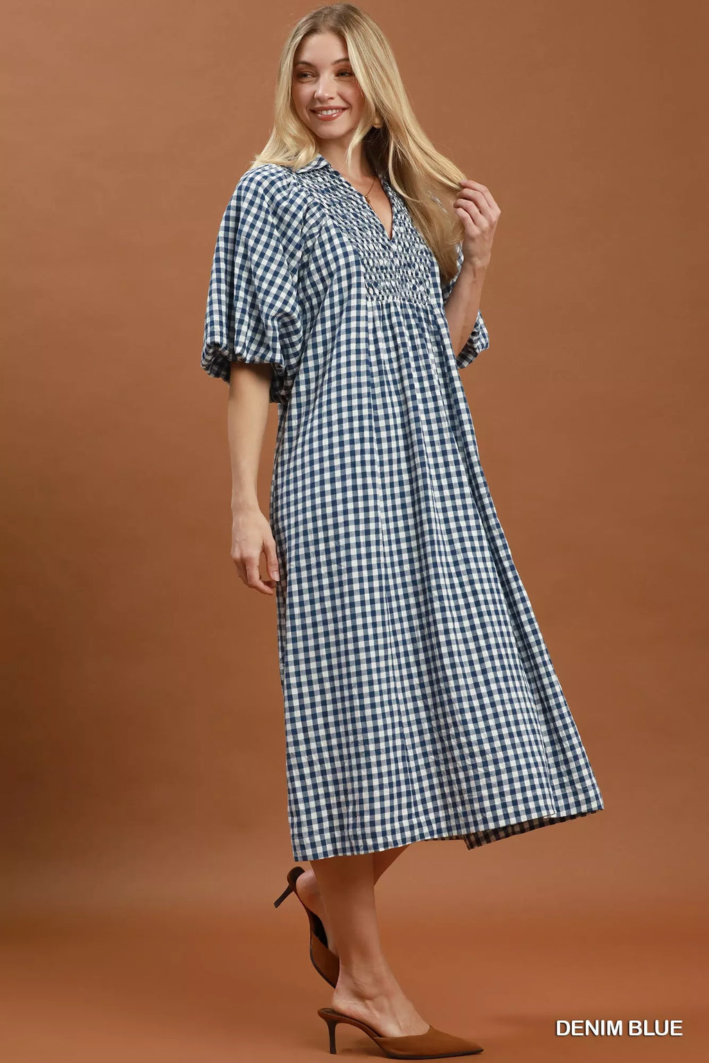 Umgee puff sleeve plaid midi dress with a fitted waist and ruffled details, perfect for casual or semi-formal wear.