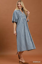 Umgee puff sleeve plaid midi dress with a fitted waist and ruffled details, perfect for casual or semi-formal wear.