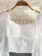 Swiss Dot Ruffled Flounce Sleeve blouse, elegant long sleeve top for women, with feminine ruffles and delicate dot pattern.