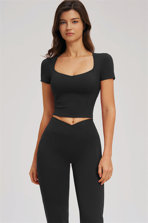 Fitglutes Activewear flared leggings and fitted top set, featuring stylish workout clothes with comfortable stretch fabric.