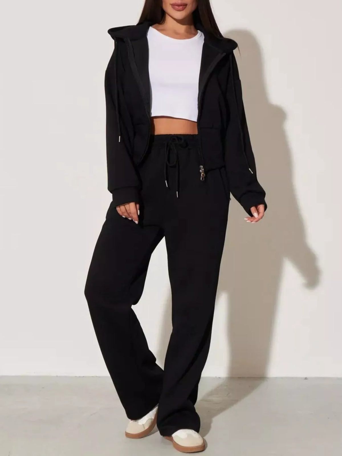 Plush Fashion Hub zip-up hoodie and wide-leg pants loungewear set, featuring comfortable fabric and casual style.