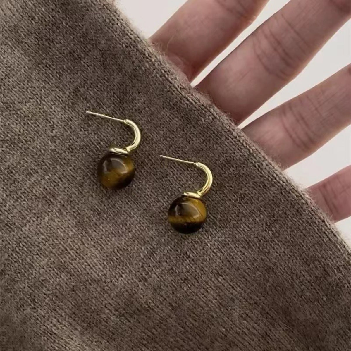Tiger Eye Ball Drop Earrings featuring polished, golden-brown gemstone beads hanging from silver hooks.
