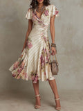 Plush Fashion Hub ruffled hem maxi dress with V-neck satin fabric and color block design, featuring an A-line silhouette.