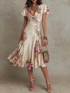 Plush Fashion Hub ruffled hem maxi dress with V-neck satin fabric and color block design, featuring an A-line silhouette.