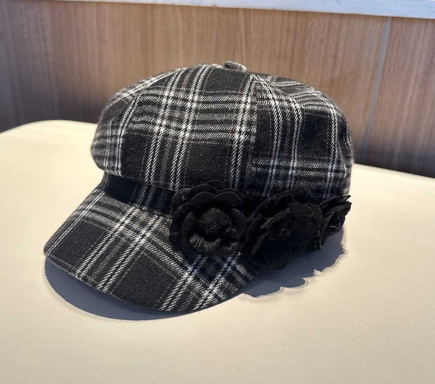 Plush Fashion Hub checkered beret in warm fabric, designed for autumn and winter, shown in a stylish close-up shot.