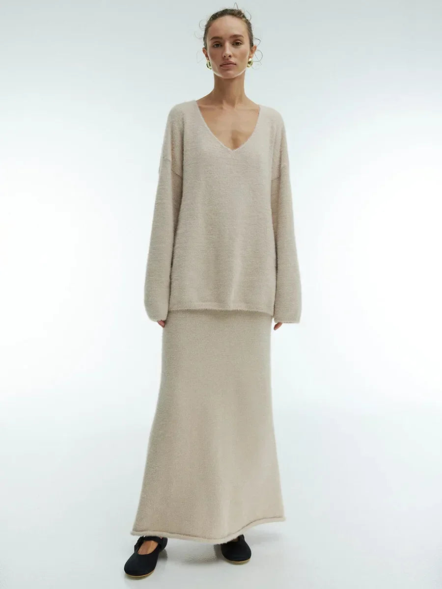 Eprolo women's knitted V-neck sweater and skirt set, warm autumn casual fashion with thick pullover and stylish skirt.