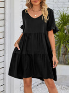 Lightweight rayon ruffled sleeve tiered mini dress with pockets, stylish and casual from Trendsi.