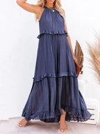 Sleeveless ruffled tiered maxi dress by Plush Fashion Hub featuring flowing fabric and layered design for a stylish summer look.