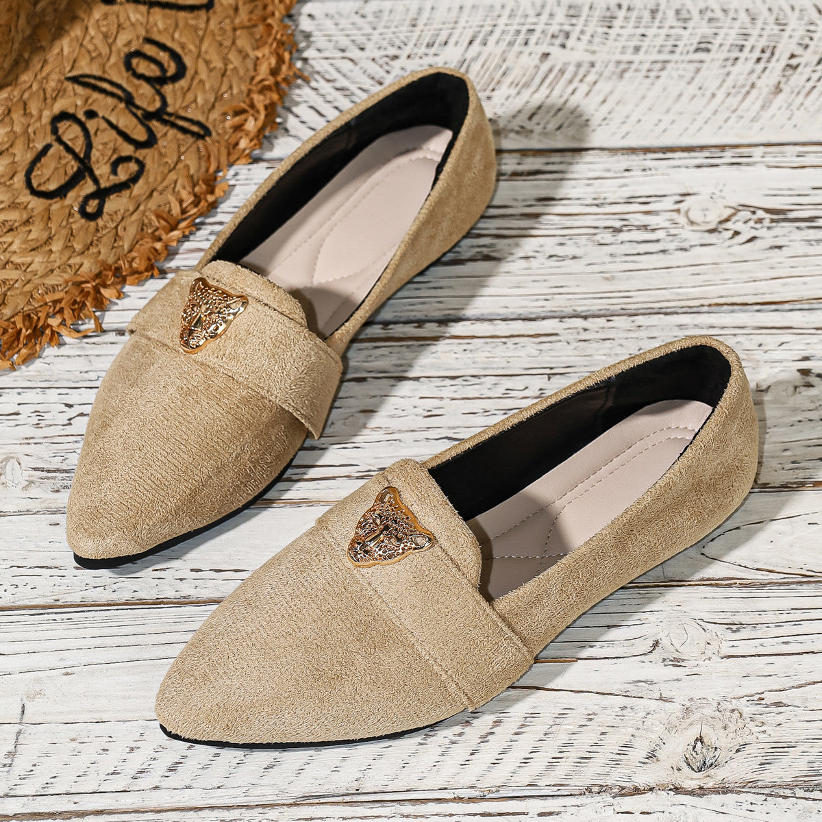 Point toe slip-on footwear by Trendsi featuring sleek design and comfortable fit, ideal for stylish everyday wear.