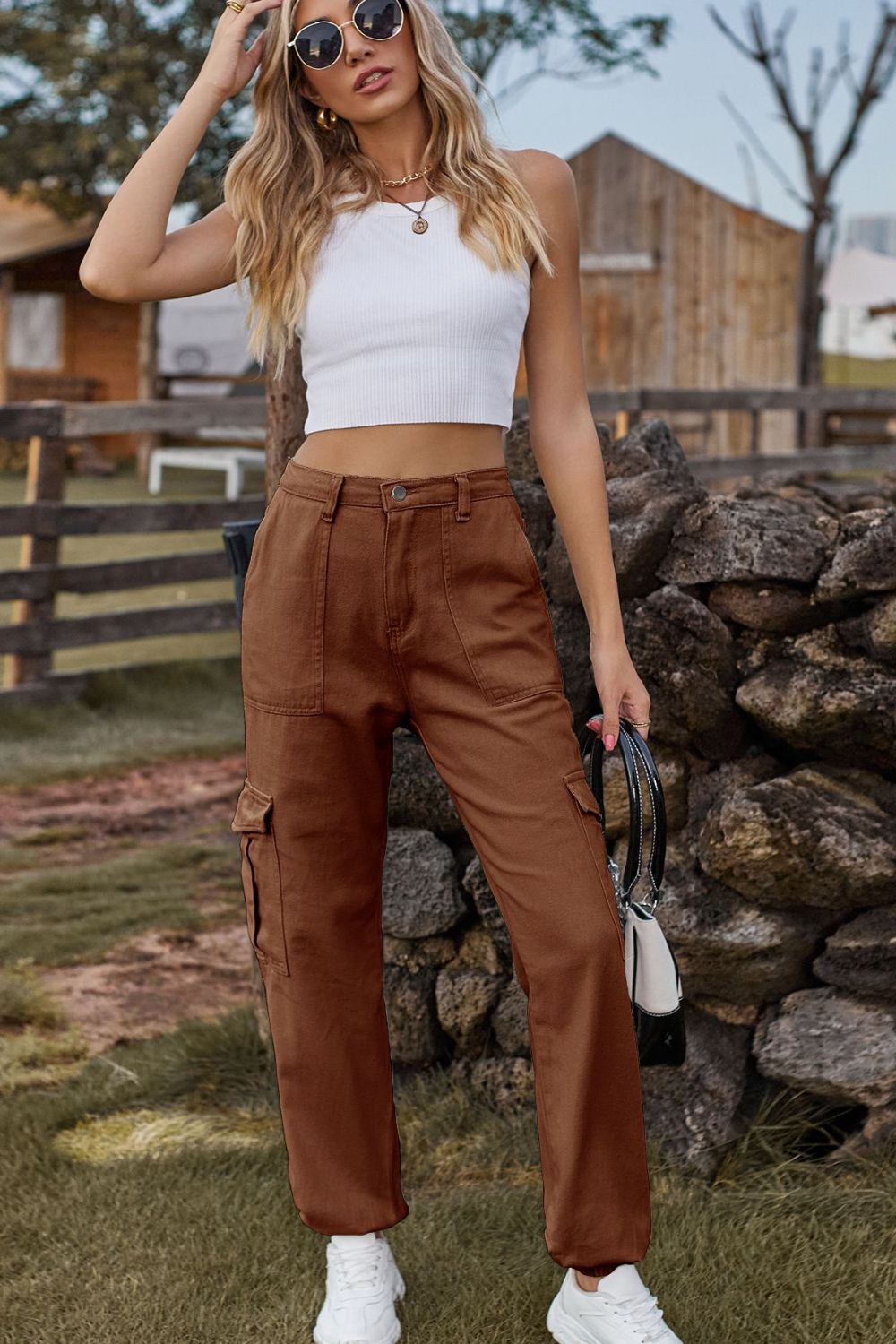 Dark blue denim long jeans with front and back pockets, styled by Plush Fashion Shop.