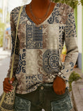 Women's ethnic print V-neck long-sleeve pullover top by FitiqueFit, featuring colorful patterns and a comfortable fit.