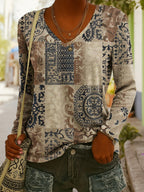 Women's ethnic print V-neck long-sleeve pullover top by FitiqueFit, featuring colorful patterns and a comfortable fit.