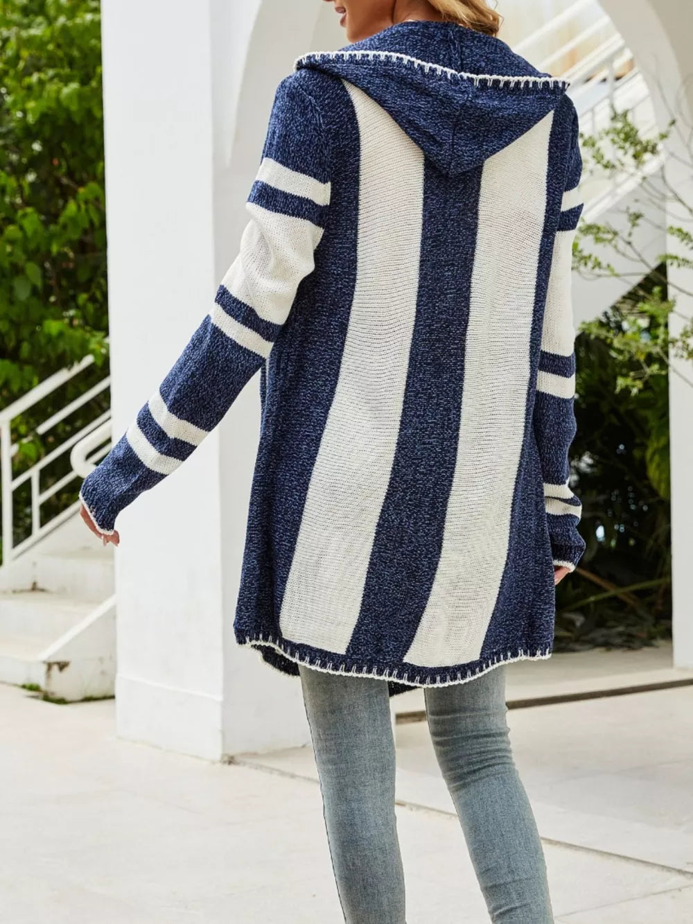 Striped hooded open front cardigan by Plush Fashion Hub featuring a cozy, casual design with bold stripe patterns.