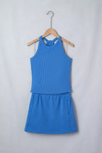 Sleeveless cropped top and pocketed skort set by Shopimist, shown in natural fabric with a casual, sporty style.