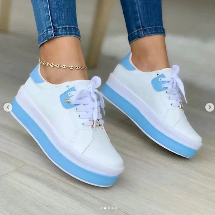 Trendsi lace-up platform sneakers showing white athletic shoes with thick soles and stylish design for casual wear