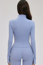Fitglutes Activewear 3-piece set with Kinetic Zip Jacket, cross-back sports bra, and matching leggings for workout and gym.