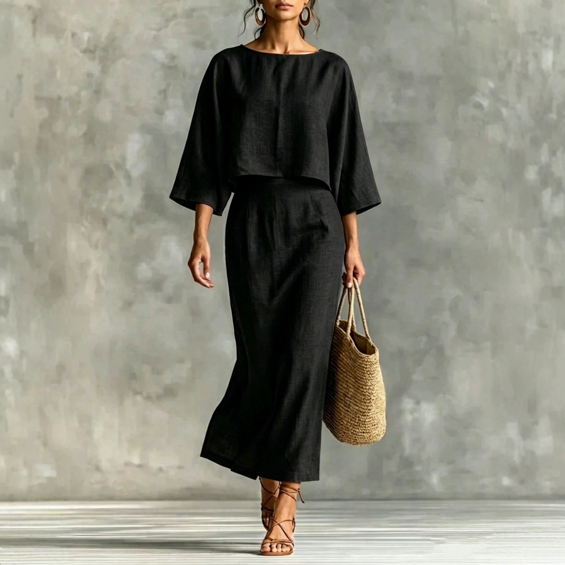 Casualwear set featuring a high waist long skirt and 3/4 sleeve loose top from FitiqueFit, displayed on a model.