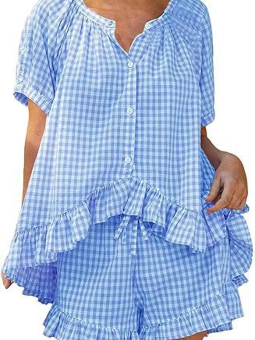 Gingham ruffle trim top and shorts set by Trendsi, featuring a stylish, coordinated summer outfit made of lightweight fabric.