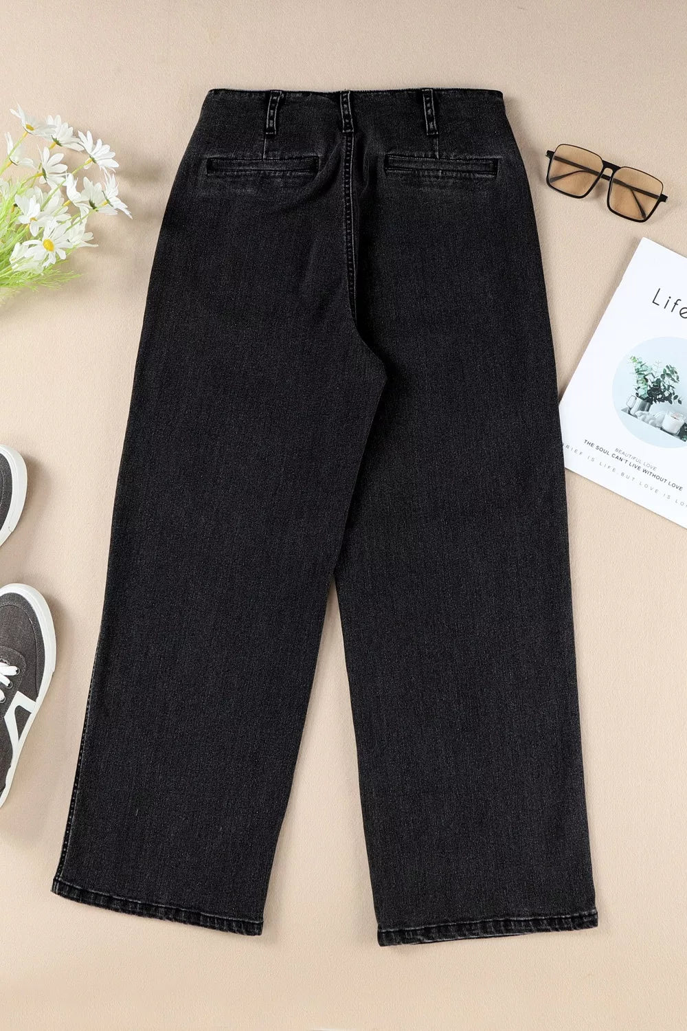 High-waisted button-fly wide-leg jeans by Trendsi, featuring classic denim with a relaxed fit and stylish wide-leg design.
