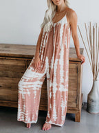 Full size Shopimist tie-dye wide leg jumpsuit with a relaxed fit, featuring vibrant colors and a sleeveless design.