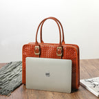 Women's hand-woven handbag made of vegetable-tanned full-grain cowhide leather, showcasing intricate craftsmanship and natural texture.