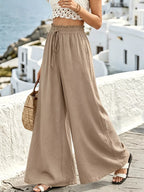 Wide leg drawstring pants from Shopimist, featuring a relaxed fit and adjustable waistband in a casual style.