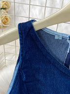 Button detail vest and flare jeans denim set by Shopimist, featuring a stylish sleeveless vest with buttons and high-waisted flared jeans.
