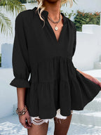 Notched neck tiered cotton blend blouse with flounce sleeves, trendy top from Trendsi, shown in a stylish, lightweight design.