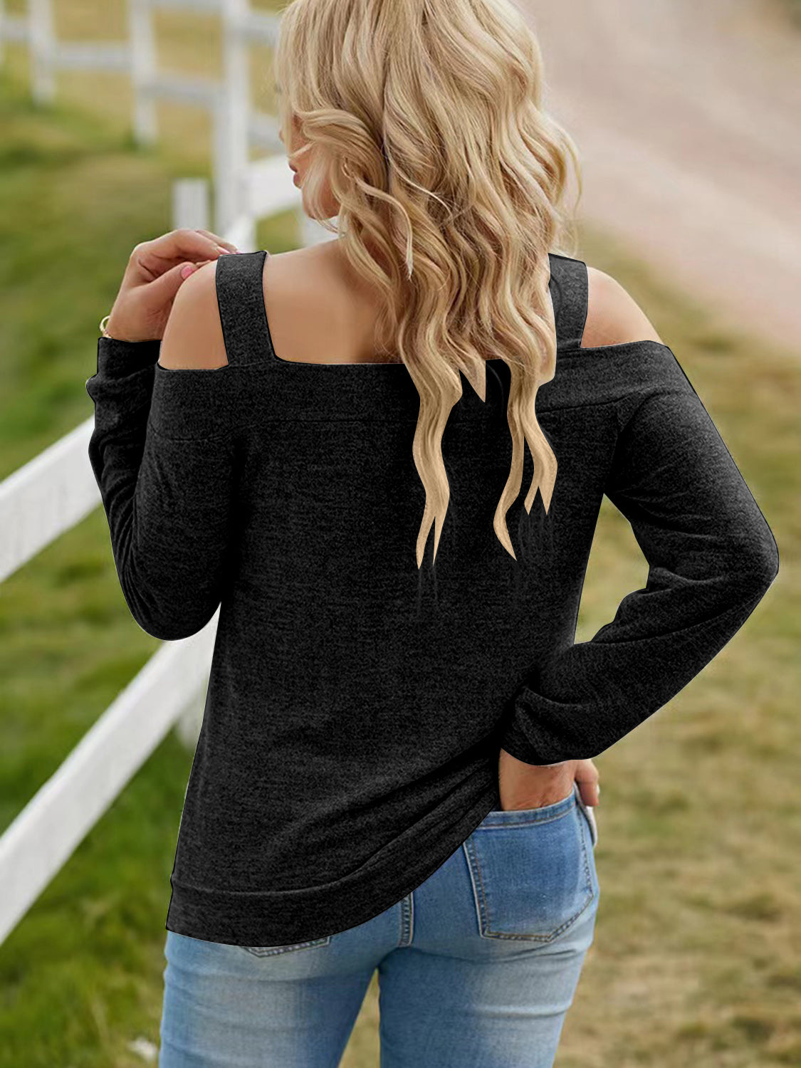 Women's elegant cold shoulder blouse with cutout details, chic casual polyester top by Trendsi, perfect for stylish everyday wear.