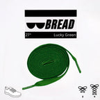 Sparkly green elastic shoelace from Plush Fashion Hub, showcasing its vibrant color and flexible design for sneakers or casual shoes.