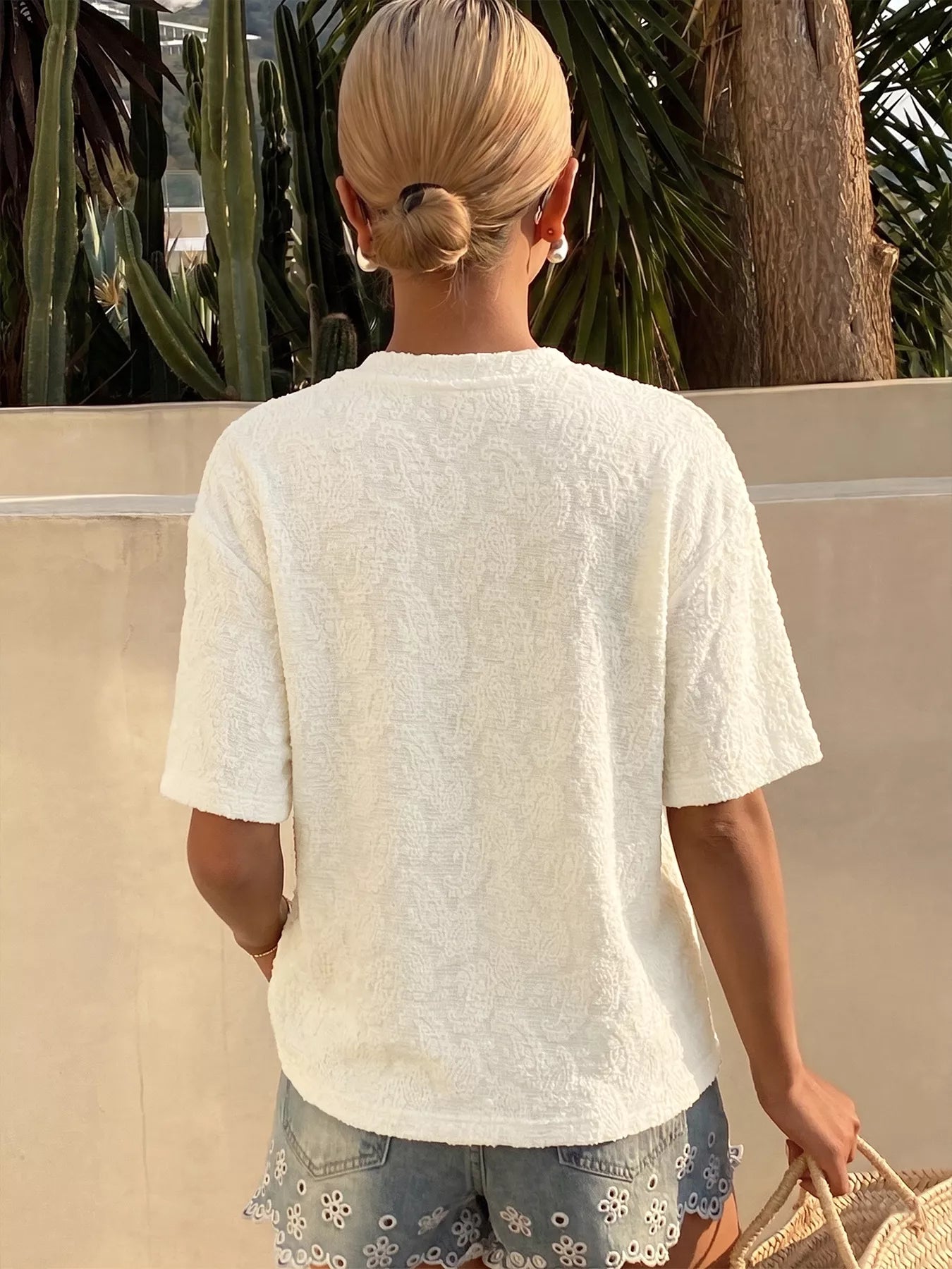 Textured paisley pattern casual T-shirt by Plush Fashion Hub, showing the detailed paisley print and relaxed fit.