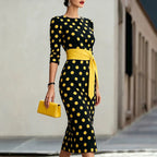 Women's retro polka-dot bodycon midi dress by FitiqueFit featuring a belted cross-tie waist, perfect for casualwear.