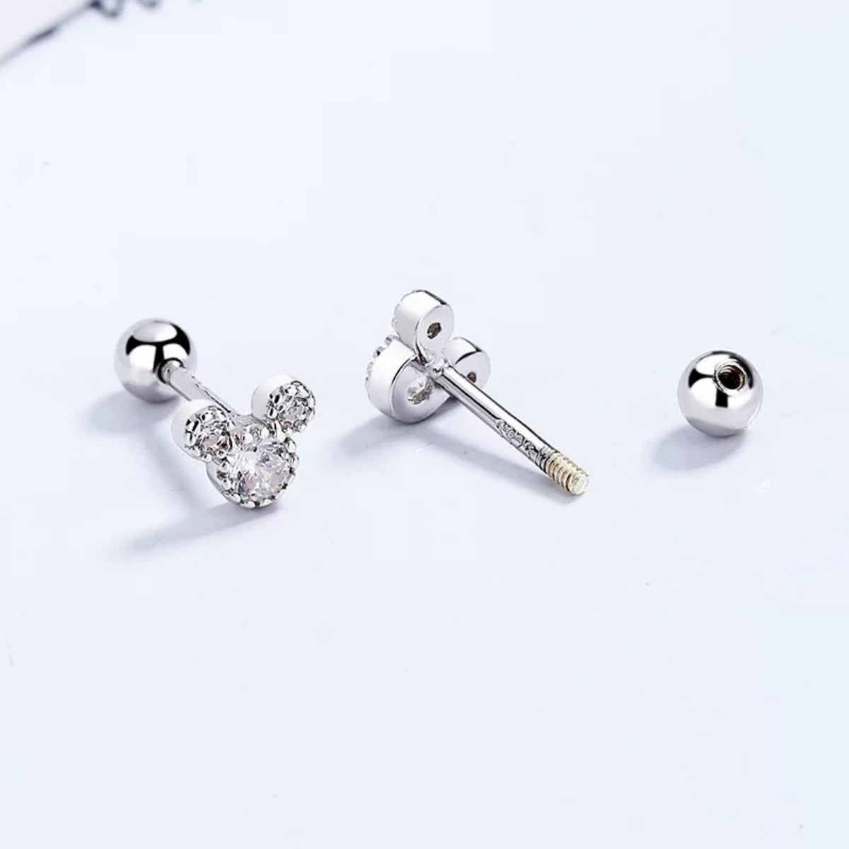 Silver Mickey Mouse stud earrings from Plush Fashion Hub, featuring classic cartoon character design, perfect for casual and fun accessories.