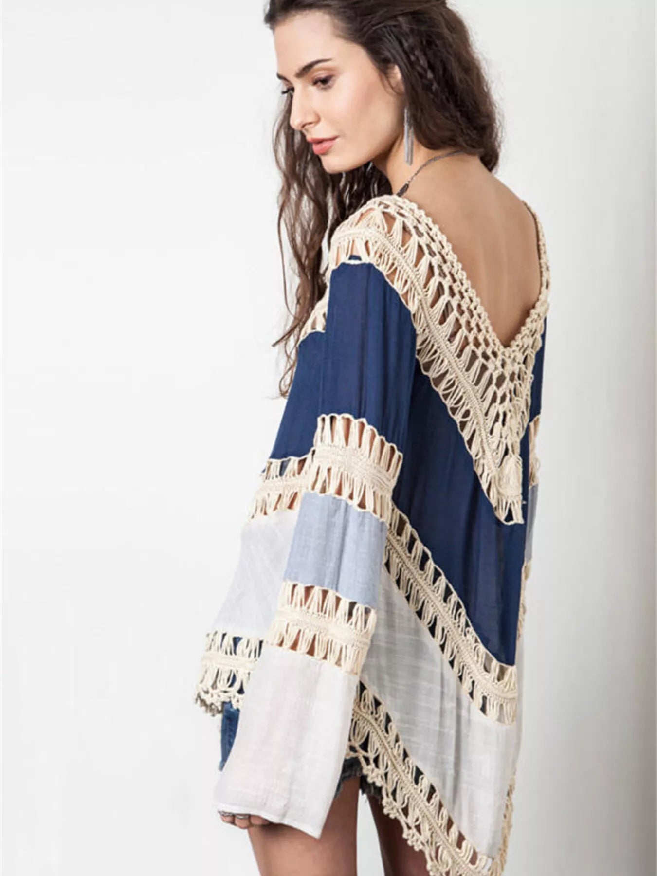 Crochet trimmed long sleeve swim cover up by Trendsi, lightweight fabric, featuring intricate crochet details and a relaxed fit.