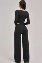 Fitglutes Activewear long sleeve crop top from The Swoon collection, shown in a stylish and fitted design for workout and gym wear.